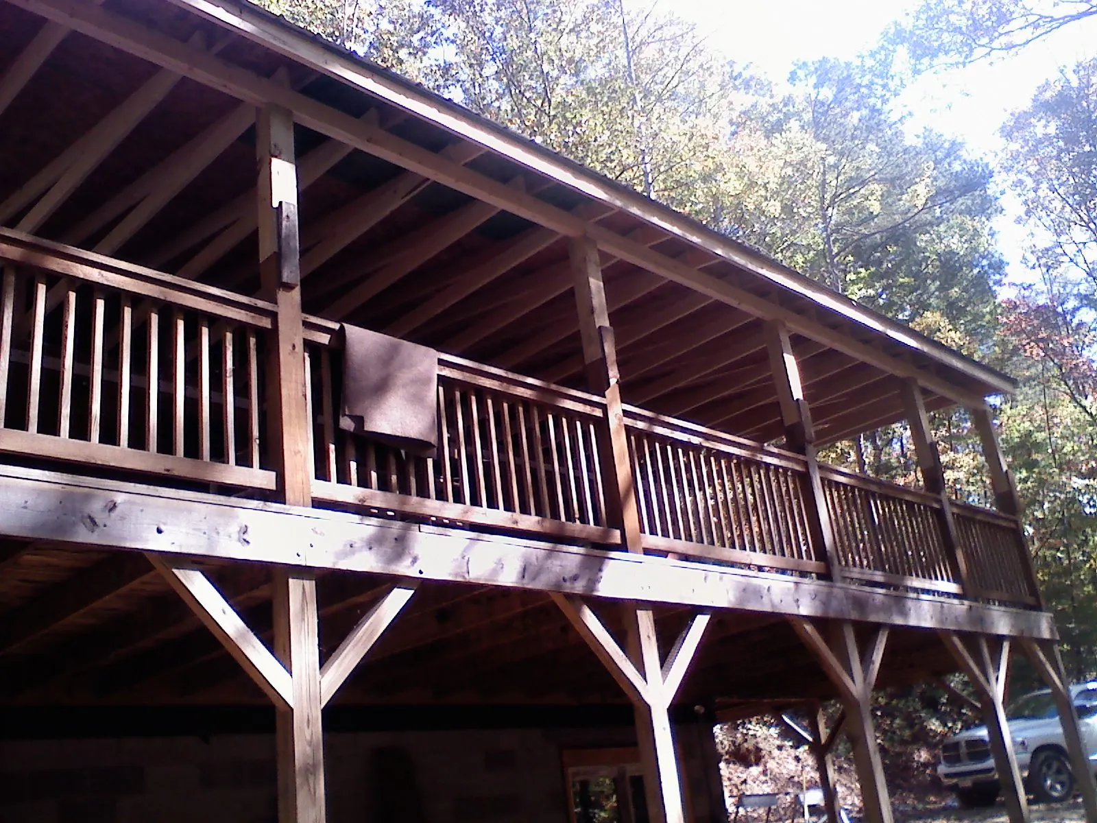 Timber framing under a new elevated porch and deck — Roof Leak Repair in Mckenna by Roofing Brothers